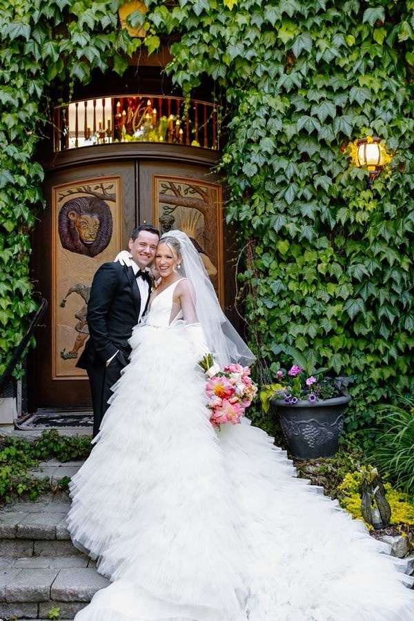 White Trendy Deep V-Neck Tiered A-Line Tulle Wedding Dresses with Cathedral Train